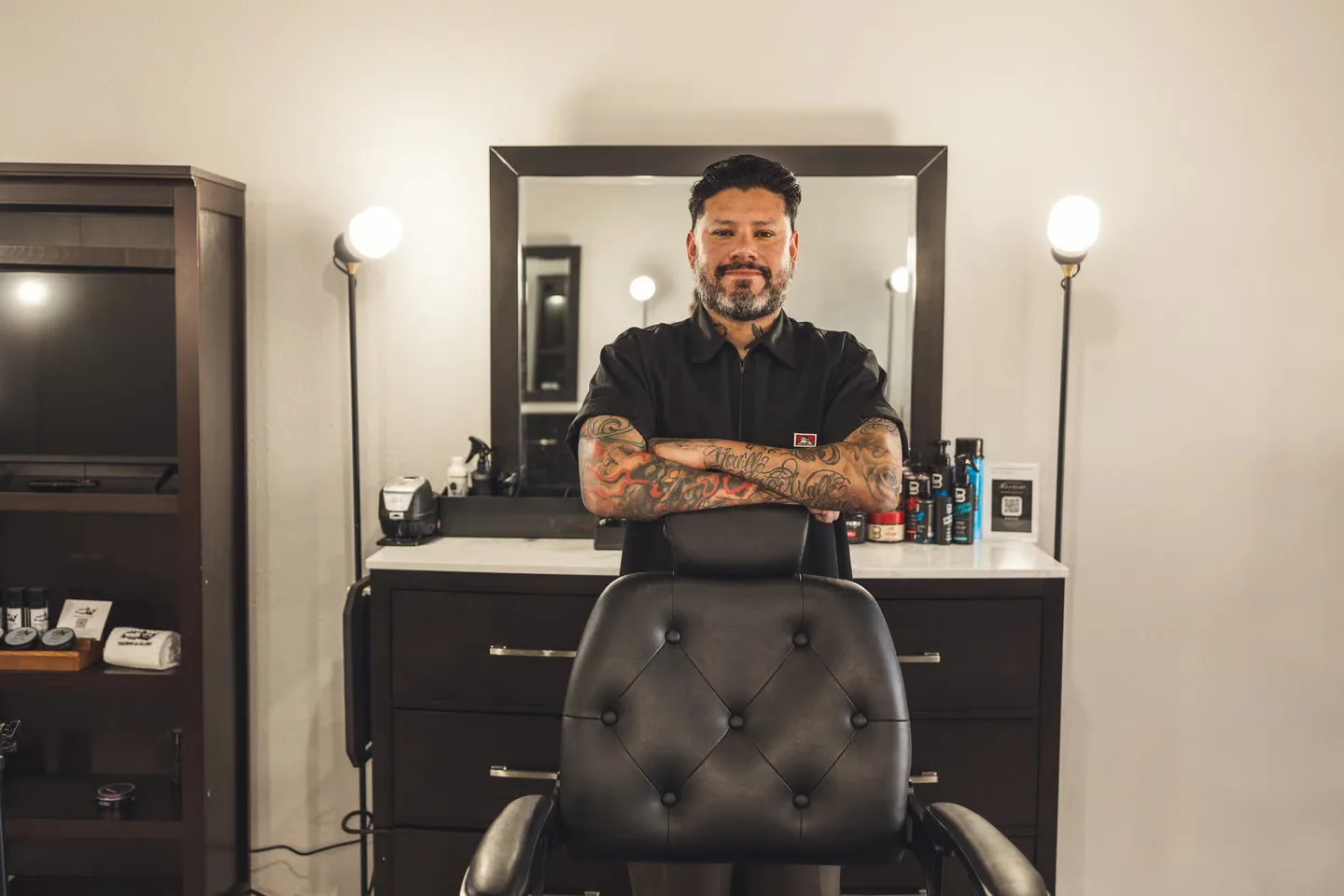 Kenny Negron, barber at Masters Barber & Shave